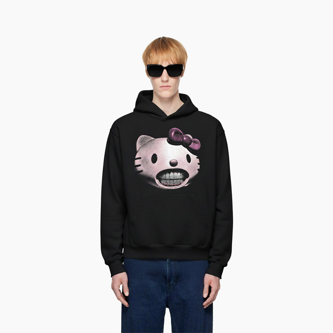 Person wearing a black hoodie with a graphic design on a white background
