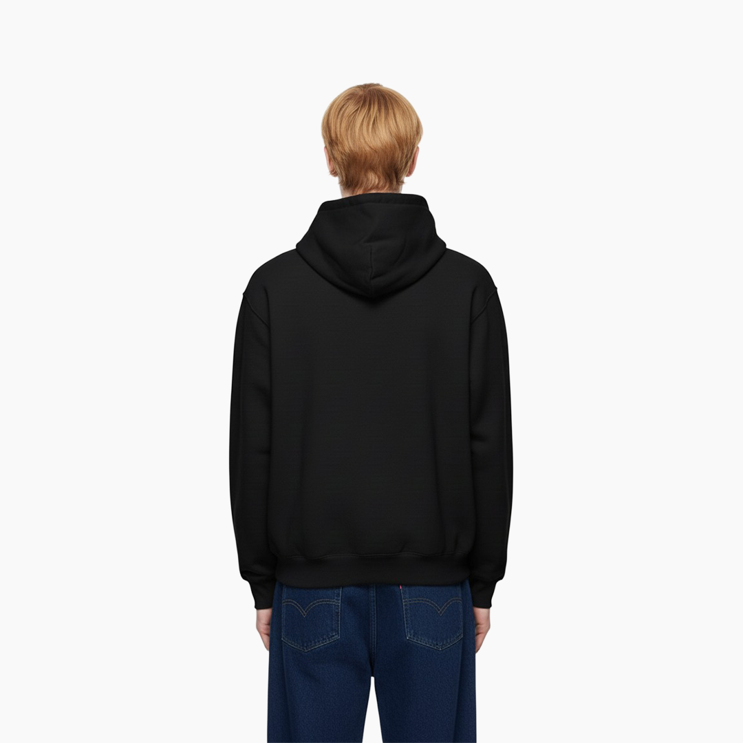 Person wearing a black hoodie on a white background