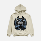 ivory colored hoodie with a graphic of a blue dragon character with diamond grillz. sitting over three stars.