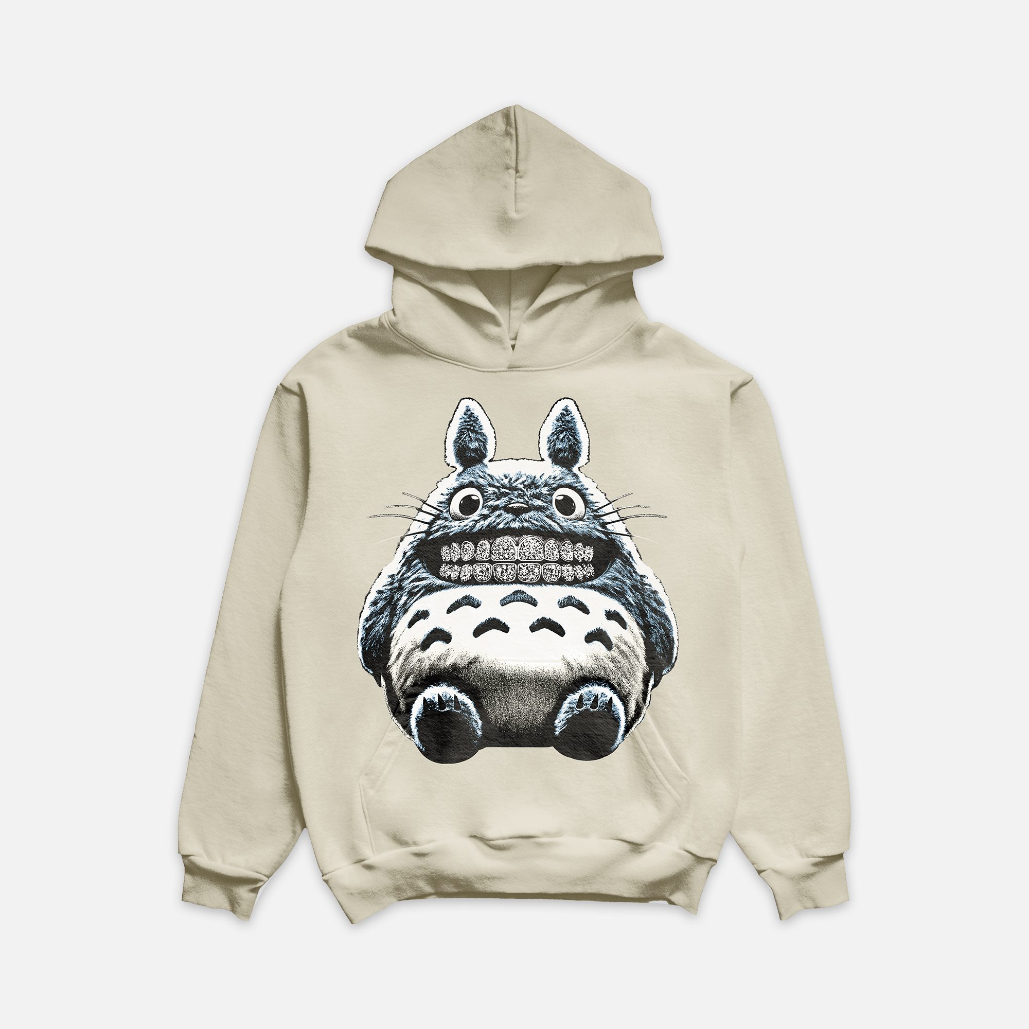 Ivory colored hoodie with a graphic of a light blue and tan fuzzy creature that has diamond grillz.